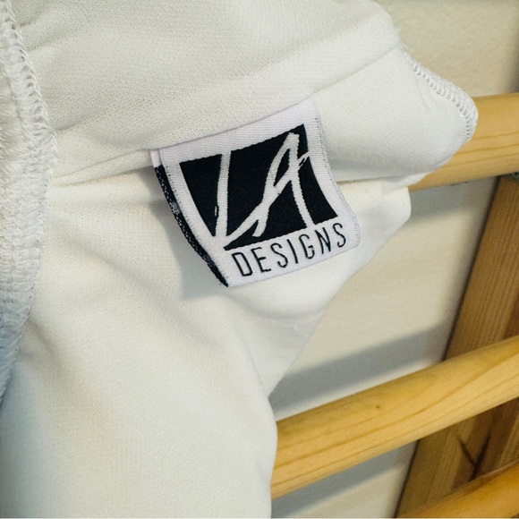 LA Designs Dancewear Jr. Child White Leotard - Picture 7 of 11